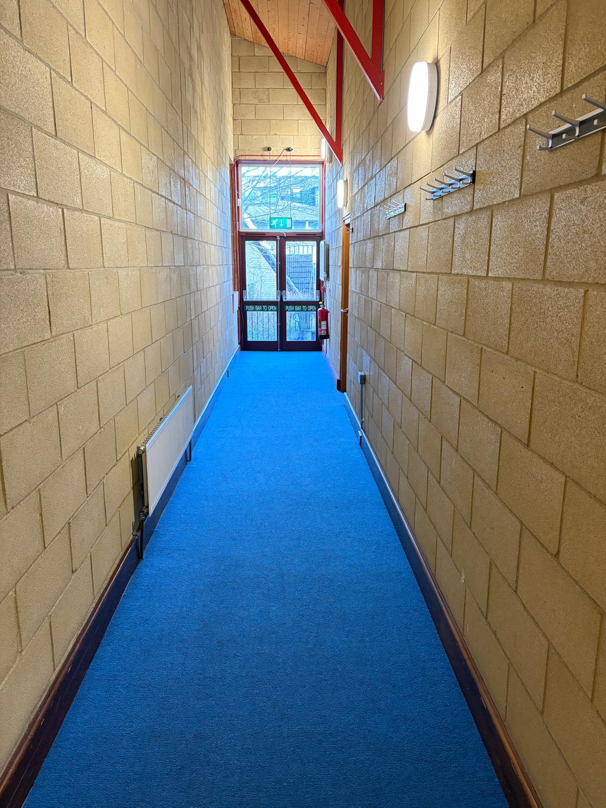 Retail unit carpet restored by Corky's Cleaning