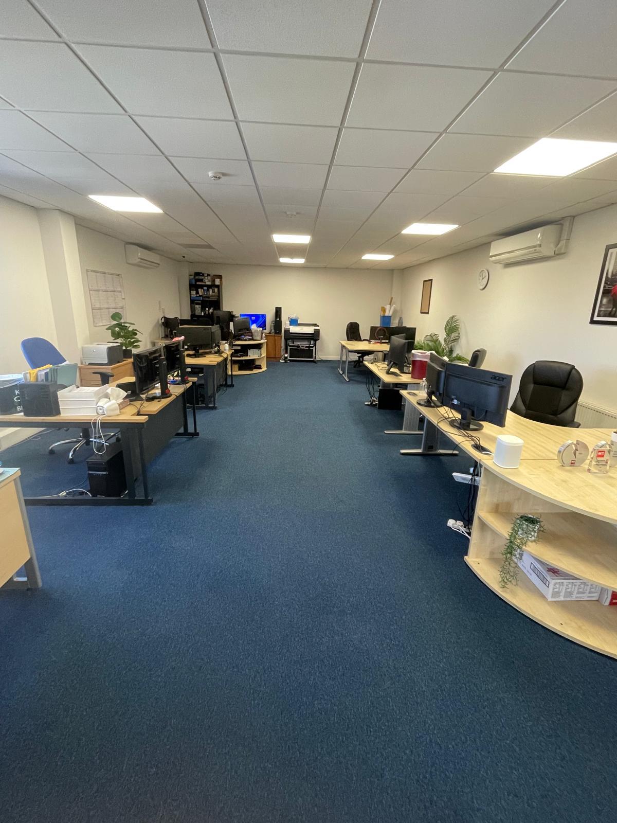 Retail unit carpet restored by Corky's Cleaning